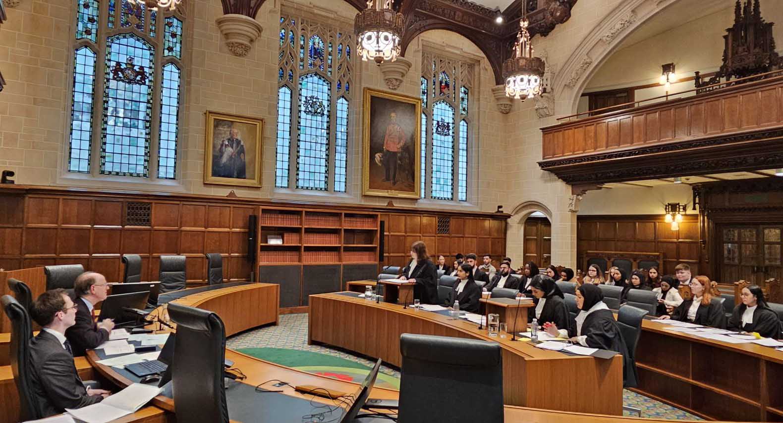 Huddersfield Law School students presenting in a mooting competition at the Supreme Court