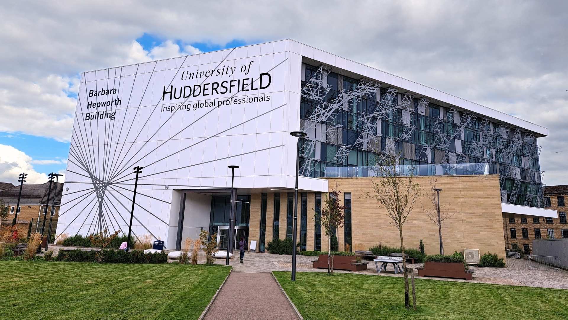 An angular white building which says Barbara Hepworth on the side in large black letters