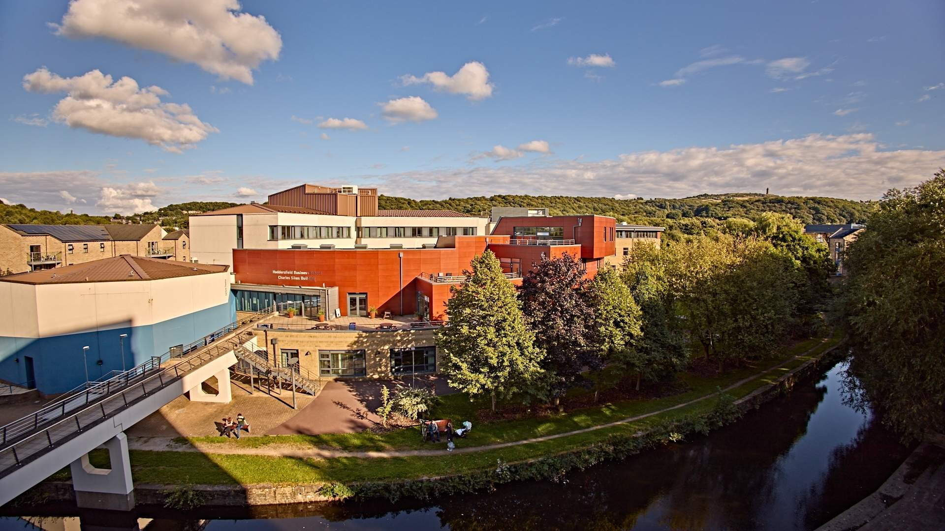 An aerial view of a river and buildings