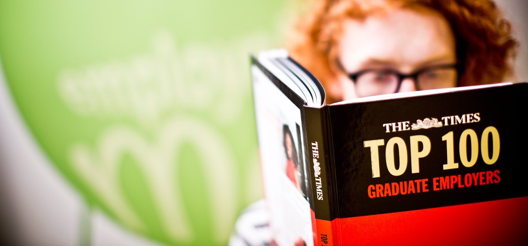A student reading a book 
