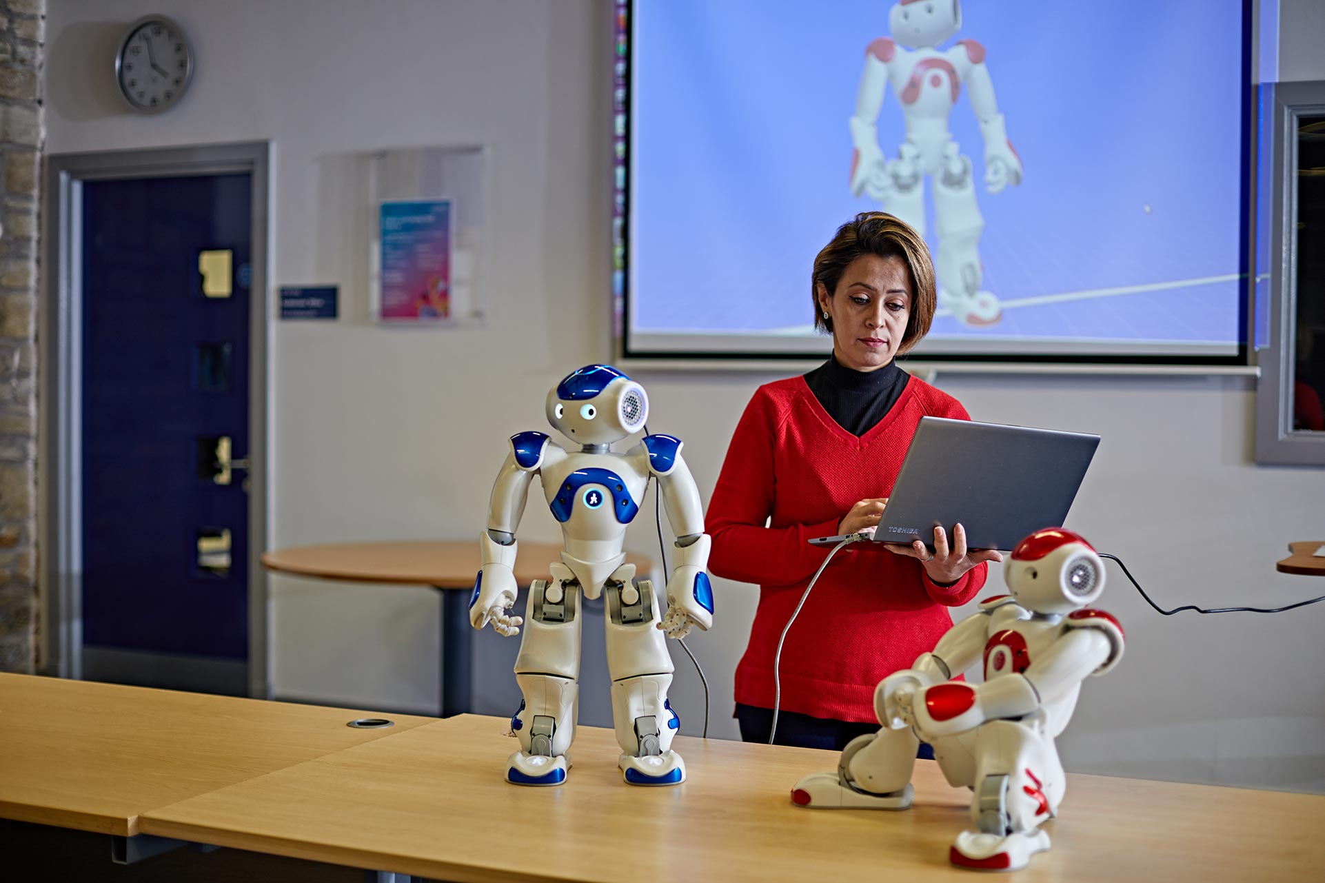 Anju Johnston and Nao Robots in design studio