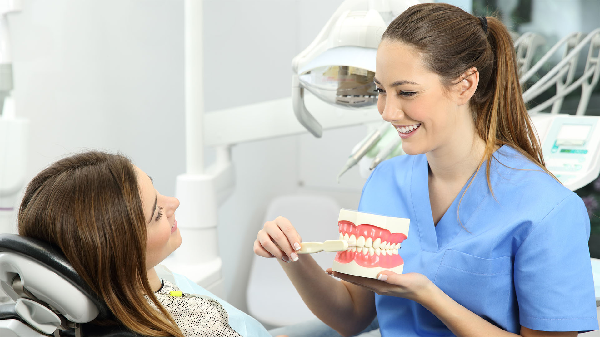 Woman brushing teeth