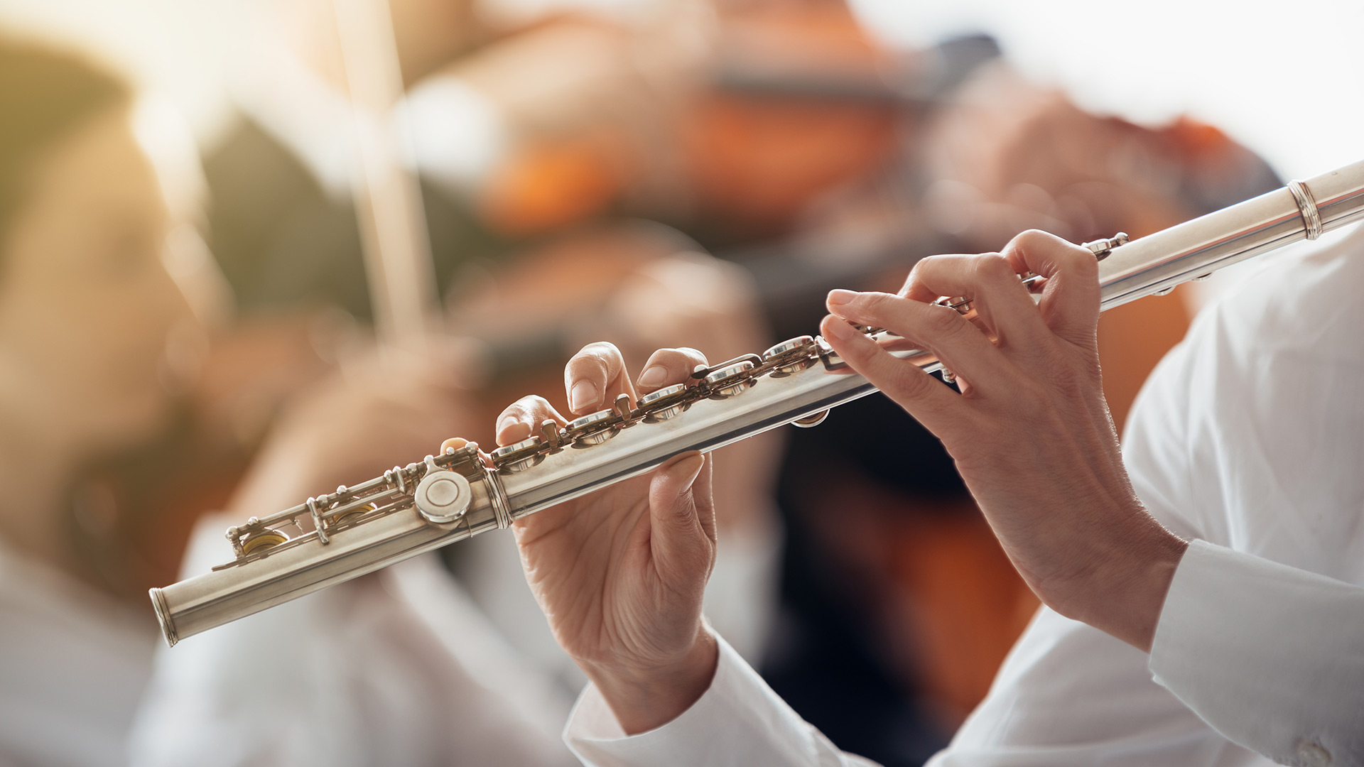 a person playing the flute