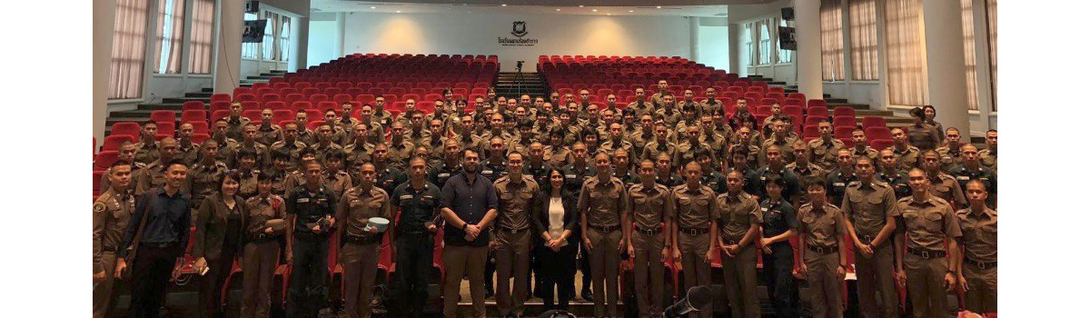 Dr John Synnott and Dr Maria Ioannou (front centre) with cadets at the Royal Thai Police Academy