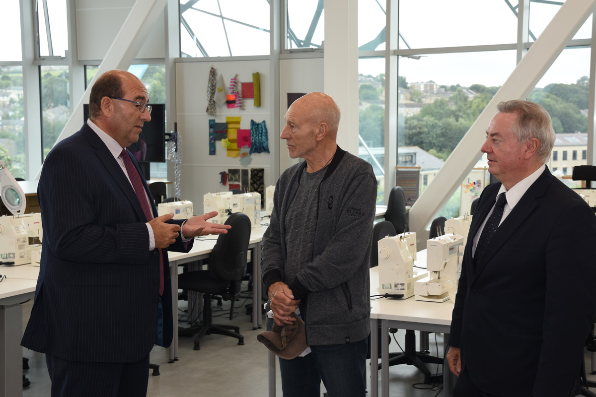 Sir Patrick Stewart (centre) with Professor Mike Kagioglou (left) in the new Barbara Hepworth Building at the University of Huddersfield