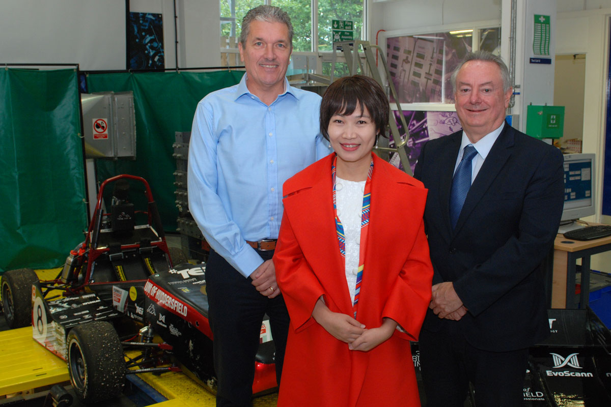 Pictured with Vietnam CEO Ms Nguyen Thi Quy Phuong are Andrew Denford (left), founder of the F1 in Schools project, and the University's Professor Bob Cryan (right).