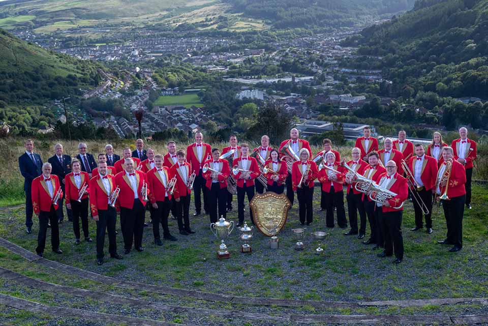 The Cory Band standing on a hill in Wales