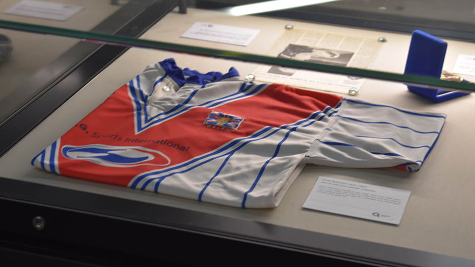 A women's rugby league shirt in a cabinet