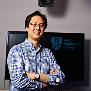 Dr Hyunkook Lee pictured smiling with arms folded