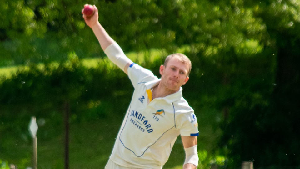 Harry Everett bowling in a cricket match