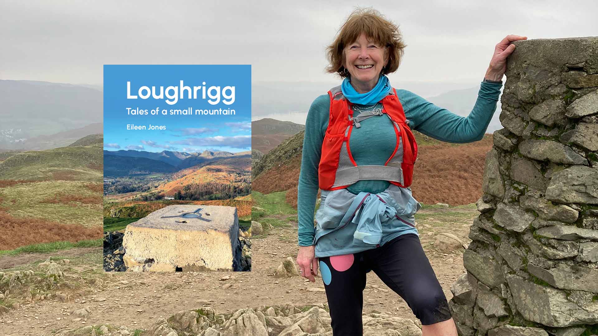 Eileen Jones and her book on a mountain top