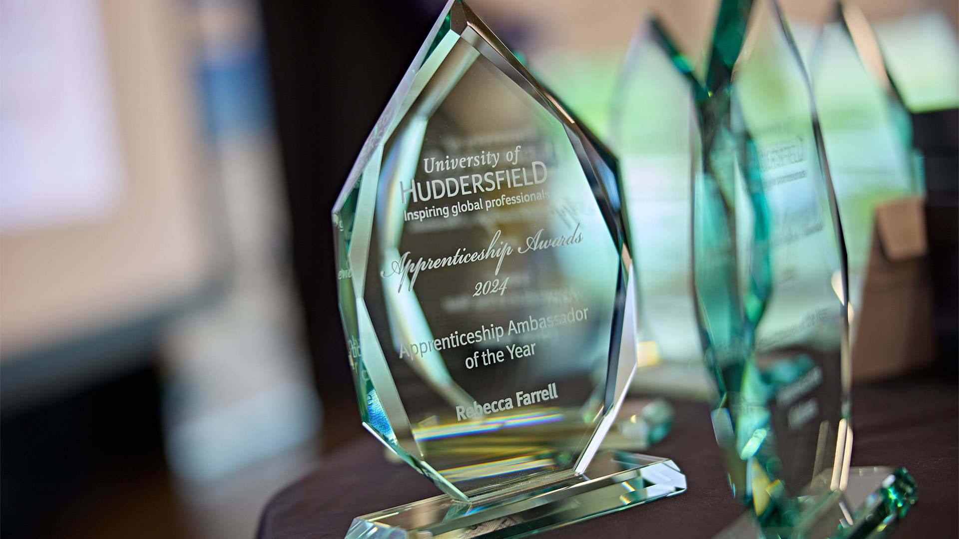 Engraved trophies on a table