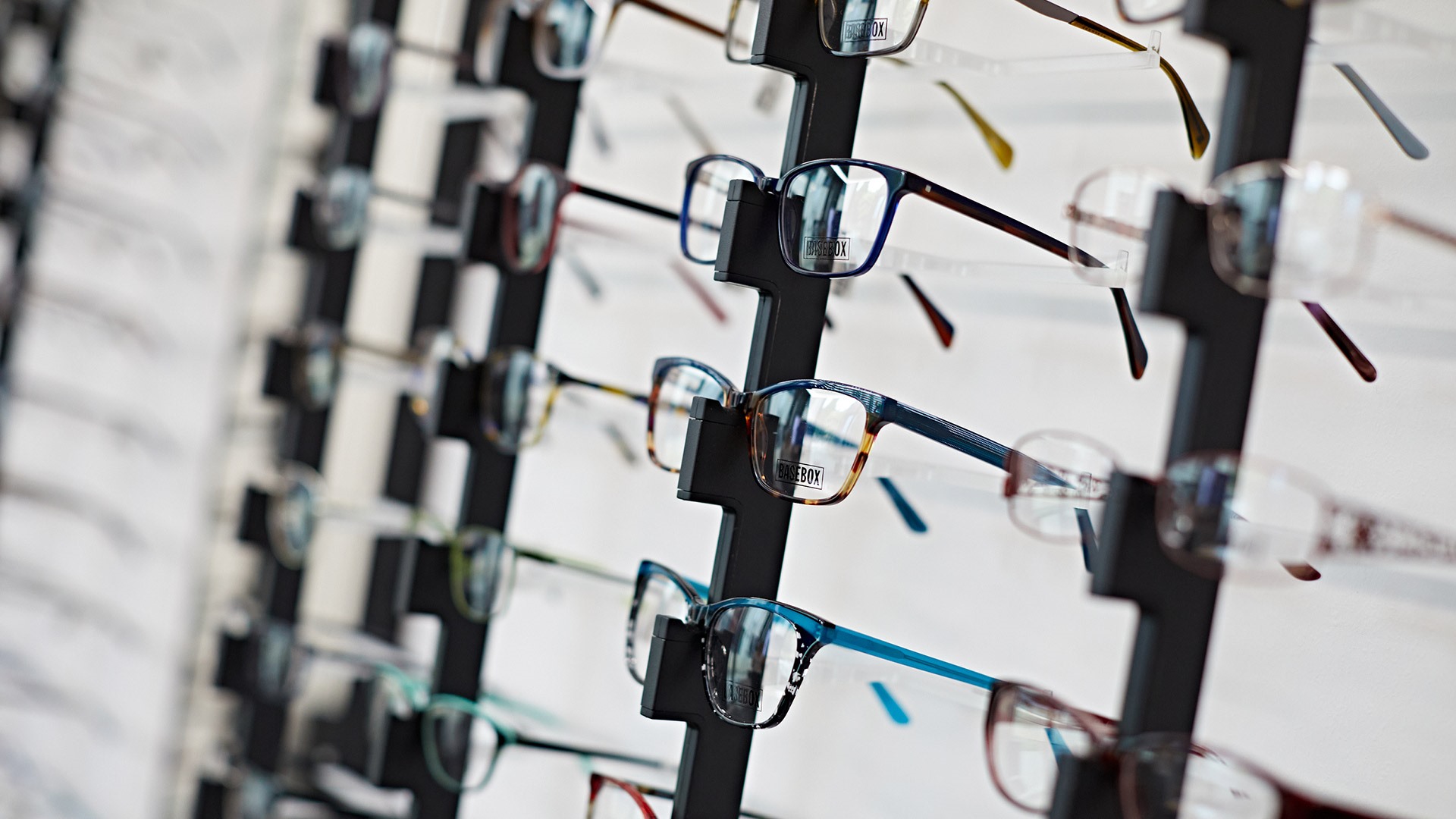 pairs of glasses in an opticians