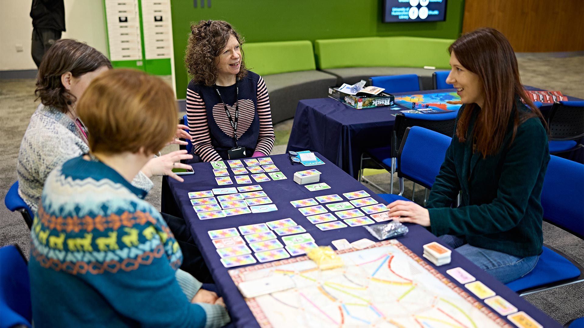students playing board games