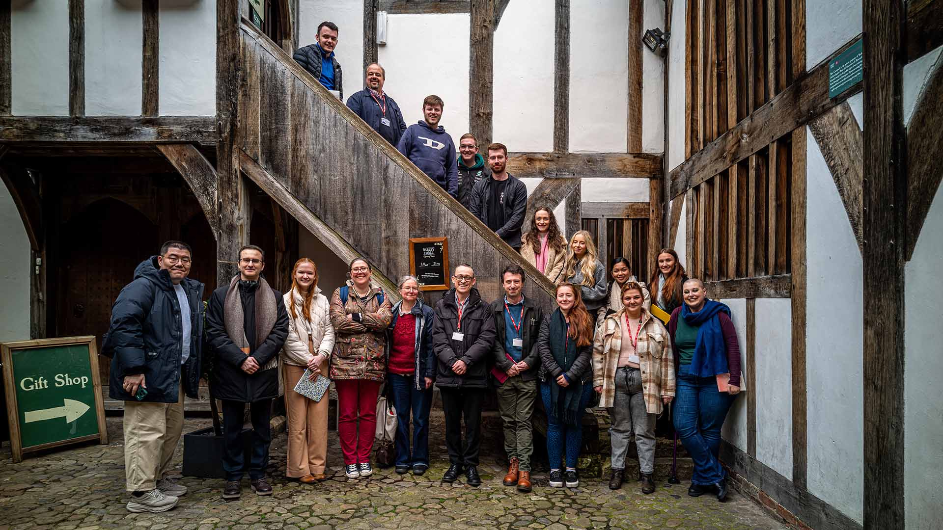 Students stand on staircase at Barley Hall