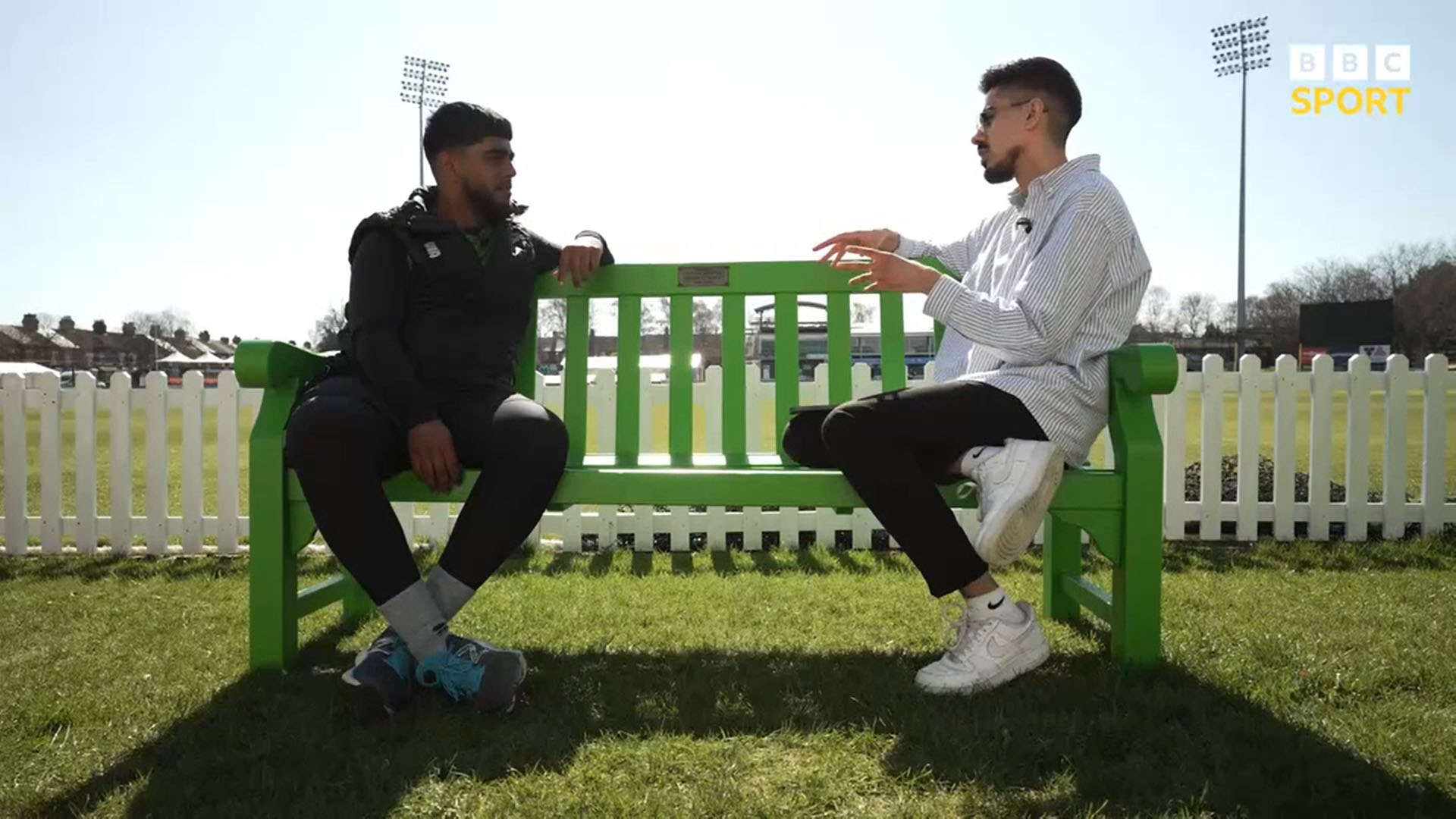 England cricketer Rehan Ahmed on the left speaking to Srosh Khan