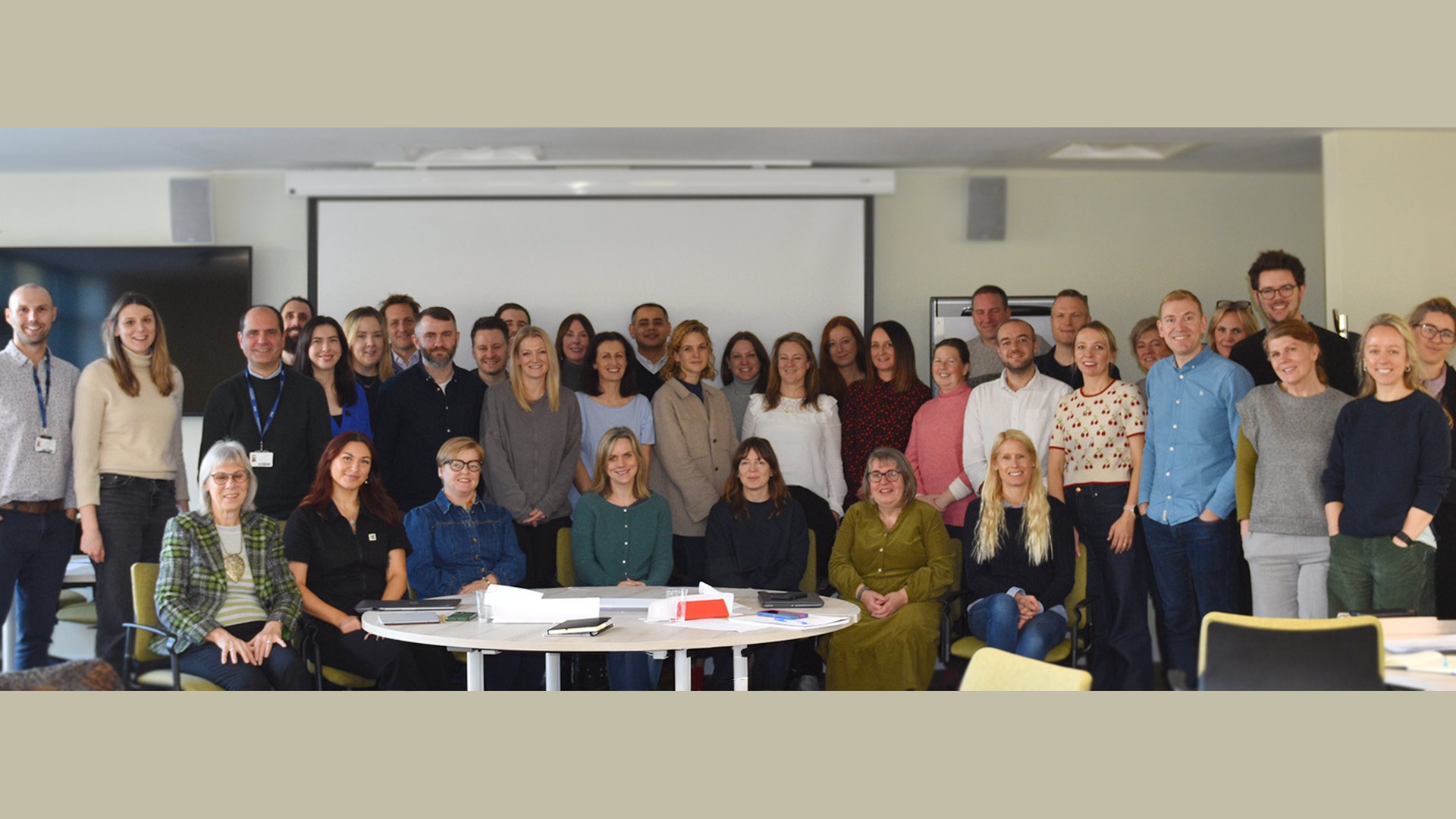 A large group of people in a classroom