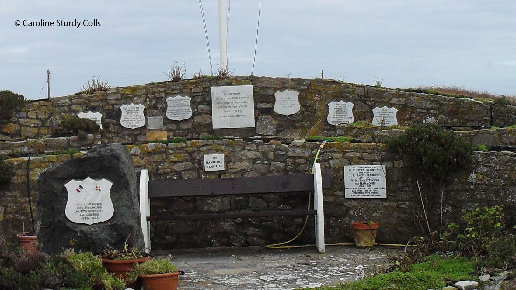 Alderney war memorial with photographer credit