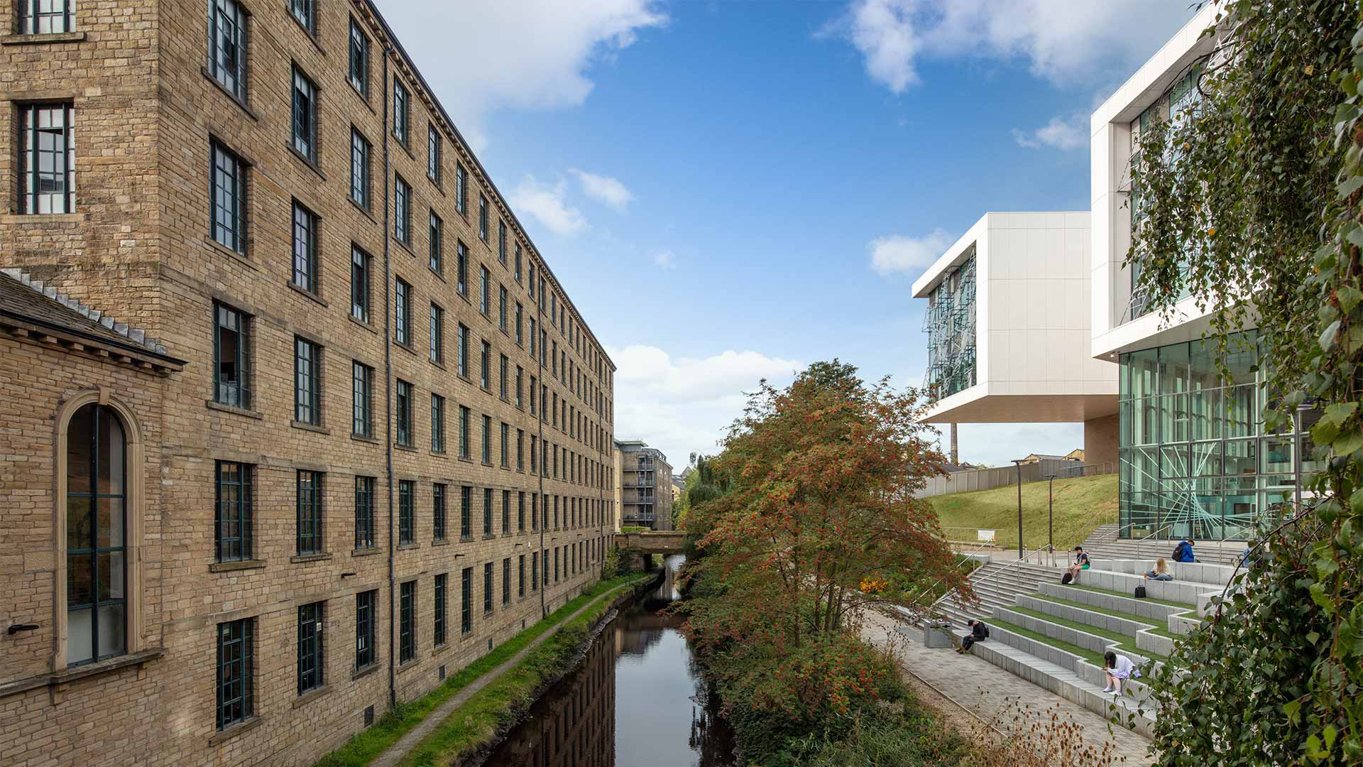 Two buildings on the University of Huddersfield campus with the canal in between