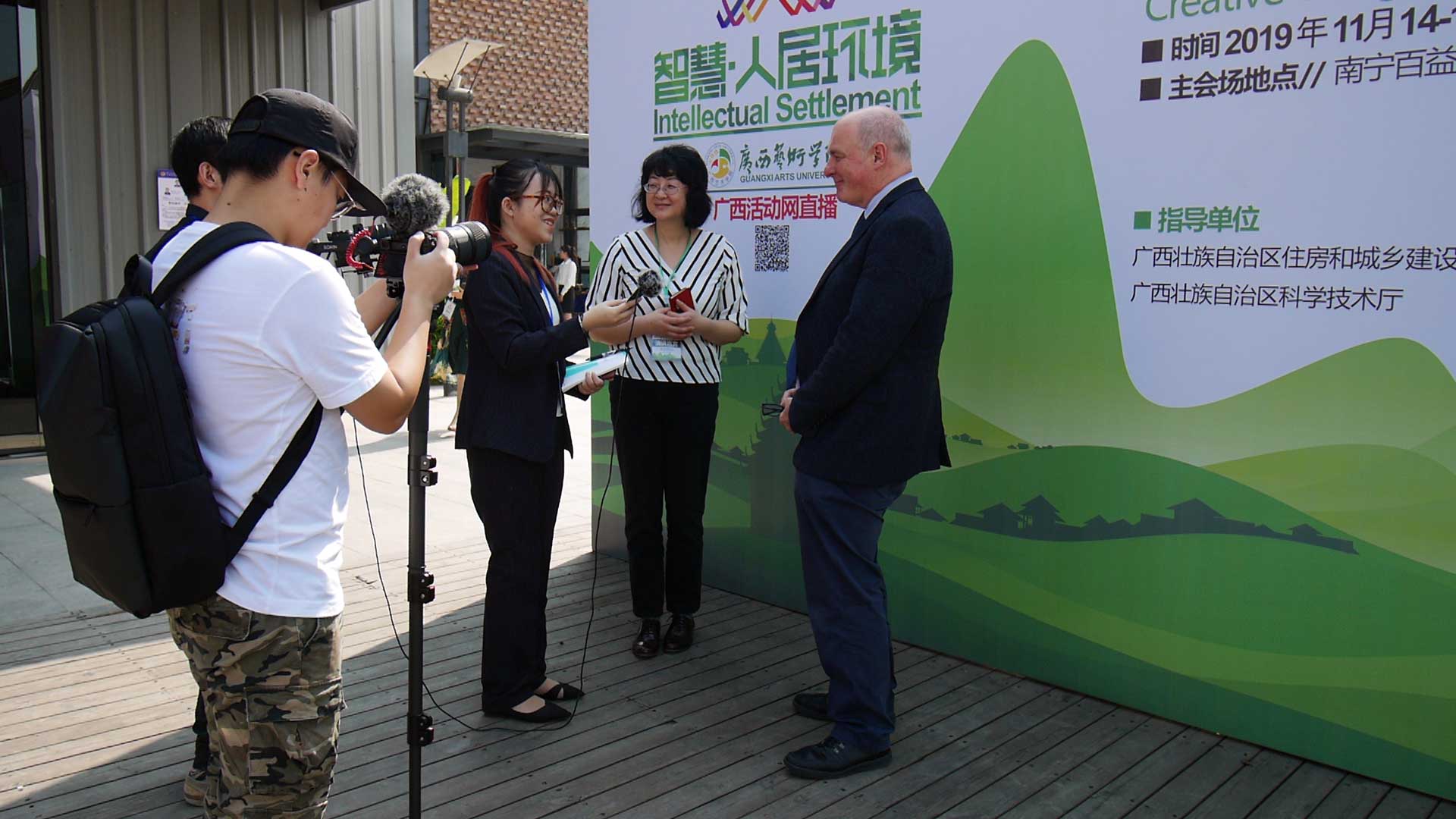 Dr Gao and Prof Pitts being interviewed for local TV in Nanning