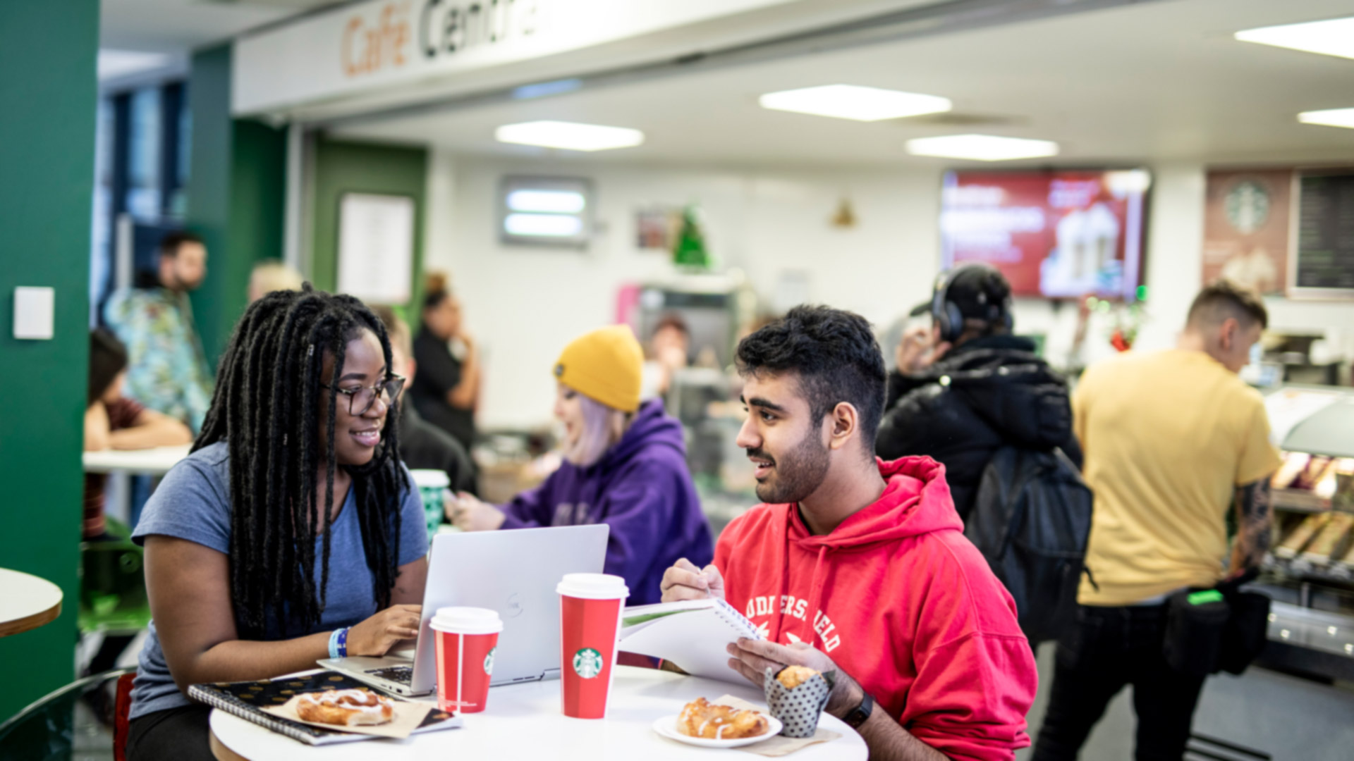 A group of students sitting in Cafe Central