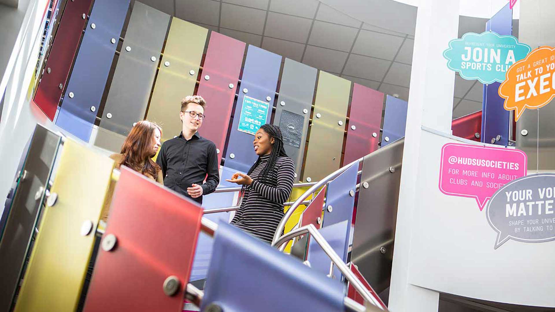 Students on stairs in student central