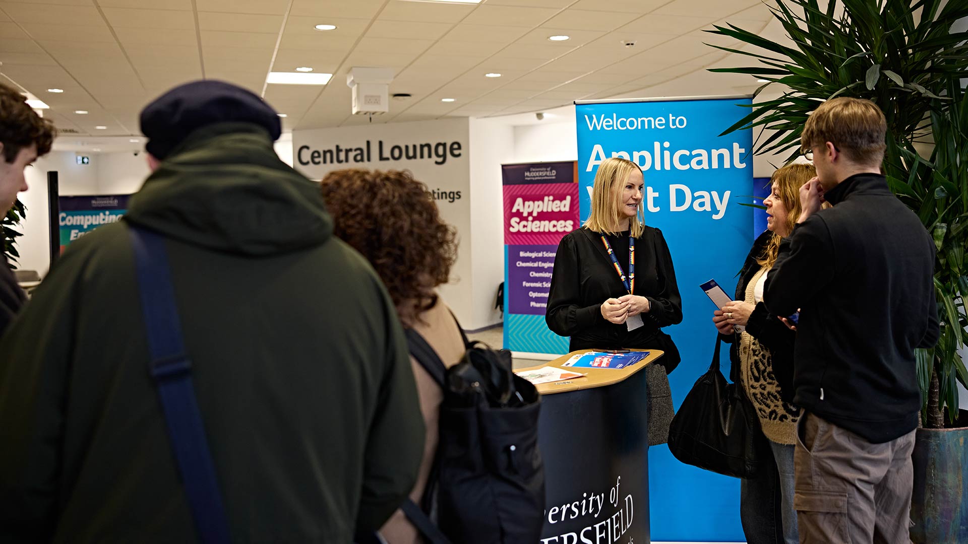 Guests checking in at an Applicant Visit Day.